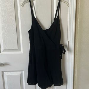 Forever 21, never worn with tags, black romper/jumpsuit, tie on the side